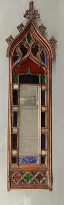 a mirror hanging on the wall in a room