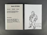 an open book with a drawing of a man in a suit and tie