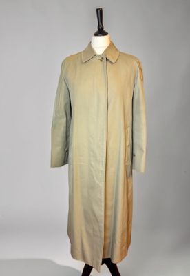 a beige coat on a mannequin mannequin mannequin mannequin mannequin mannequin mannequin mannequin mannequin