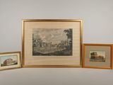 two framed pictures of buildings and a picture of an old building