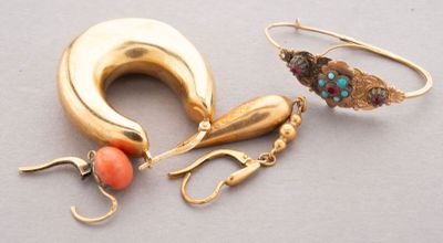 two pairs of gold and coral earrings and a pair of earrings