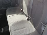 a car that has two seats in the back of it