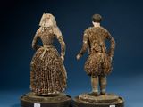 pair of figurines of a man and a woman