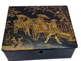 a black box with a painting of a horse pulling a carriage