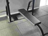 an image of a gym bench in a gym
