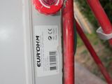 a close up of a red fire hydrant on a red scaffolding