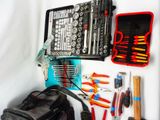 many tools that are laying out on the table