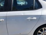 a white car that is parked in a parking lot