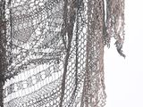 a close up of a piece of lace on a mannequin mannequin