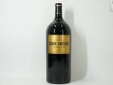 a bottle of wine that is sitting on a table