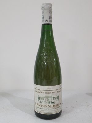 a bottle of wine that is sitting on a table