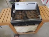 a grill that is sitting on a table in a room