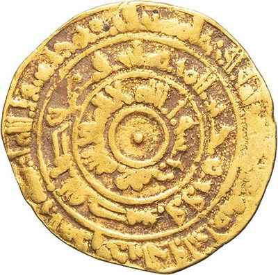 a close up of a gold coin on a white background