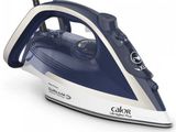 a close up of a blue and white steam iron on a white surface