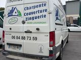 a white van that is parked in a parking lot