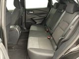 the back seats of a car are empty with no one in it