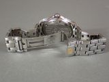 a close up of a watch on a table
