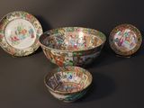 three bowls and a bowl with a picture of a woman on them