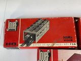 three boxed boxes of toy trains sitting on a table