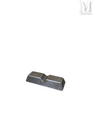 a close up of a piece of metal on a white background