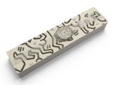 an image of a metal object with a design on it