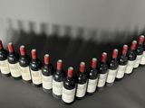 a group of bottles of wine are arranged in the shape of a heart