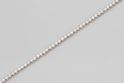 a white gold and diamond necklace