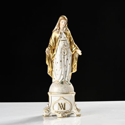 an image of a statue of the virgin mary of guadalupe on a pedestal