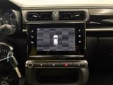 a picture of a car dashboard with a cell phone in it