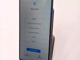 a phone that is sitting on top of a stand