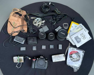 a lot of electronics that are on the table