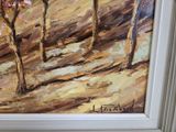 a painting of some trees in a painting on the wall
