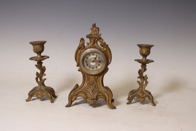 Garniture de cheminée en métal doré