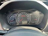 a close up of a car dashboard with a speedometer