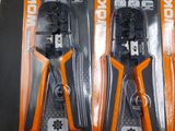 three pliers are sitting in a package on a table