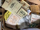 a box full of wine bottles and labels on a table