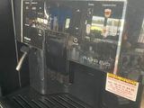 a coffee machine that is sitting on the counter