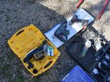 many tools that are laying out on the ground