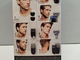a box with a picture of a man getting his hair cut