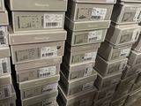 boxes stacked on top of each other in a warehouse
