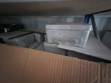 a box that is sitting on top of a cardboard box