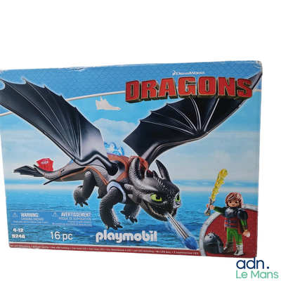a box of playmobil with a picture of a dragon on it