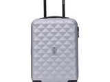 un gros plan d'une valise à roulettes sur fond blanc