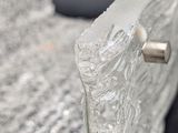 a close up of a piece of glass on a table