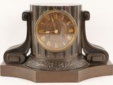 a clock that is sitting on top of a table