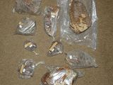 many bags of food on the floor next to each other