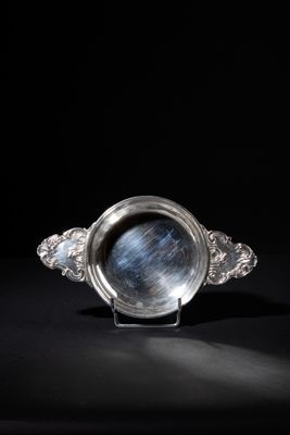 an image of a silver ring with a blue star in the center