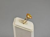an image of a ring with a citrine stone on top of it