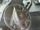 a steering wheel of a car with a key in it