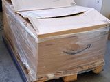 a large box sitting on a pallet in a warehouse